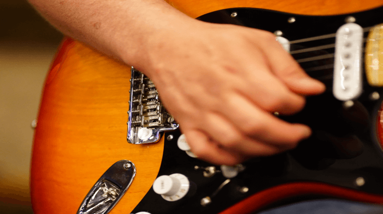 Guitar thumb muting