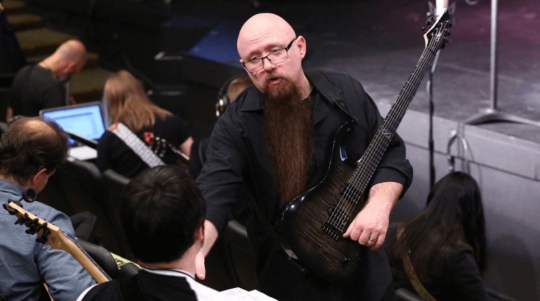 Teach guitar students to read