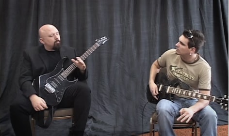 How to improve your guitar phrasing and play better guitar solos by Tom Hess