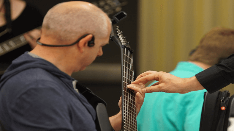 Teach guitar better
