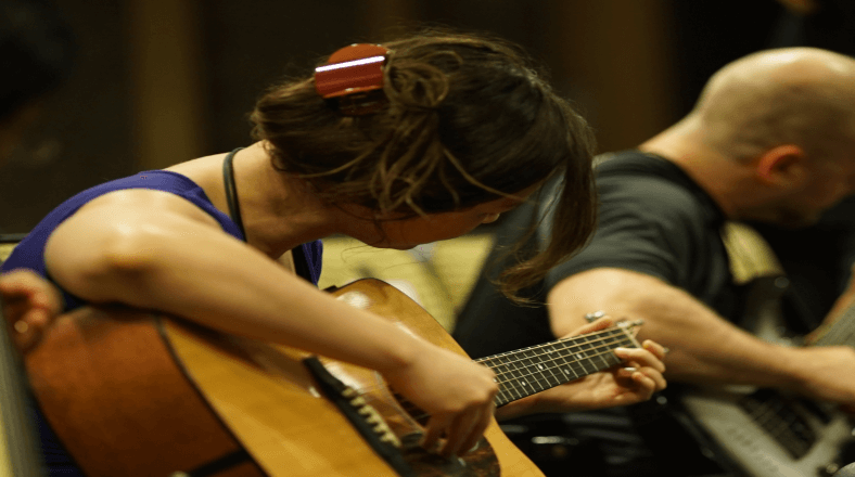 Earn money teaching guitar