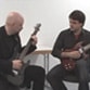 Tom Hess teaches a guitar student creativity