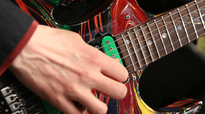 Play lead guitar creatively