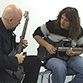 Tom Hess Giving A Guitar Lesson