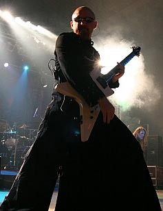 Tom Hess Playing Guitar On Stage