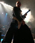 Tom Hess Playing Guitar On Stage