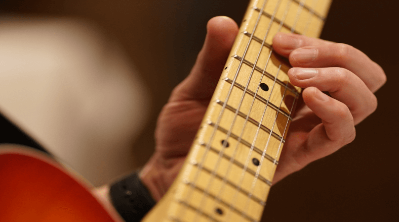 Play better guitar solos