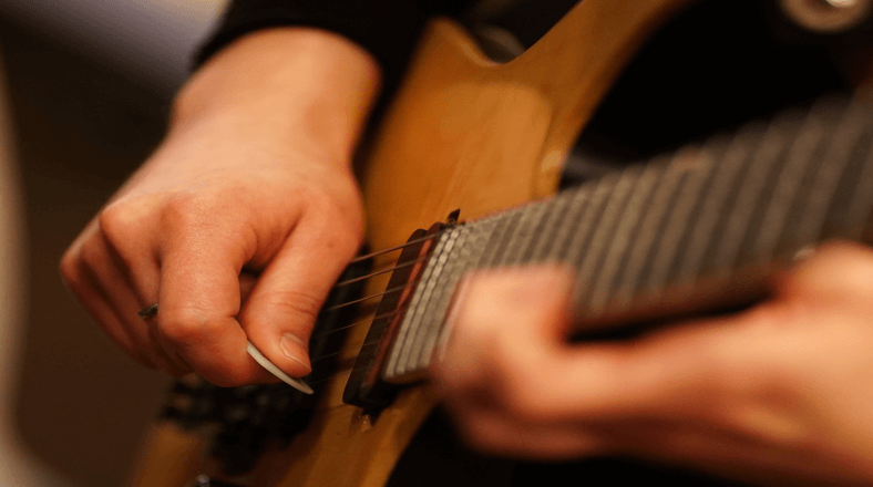 Play amazing guitar solos with scales