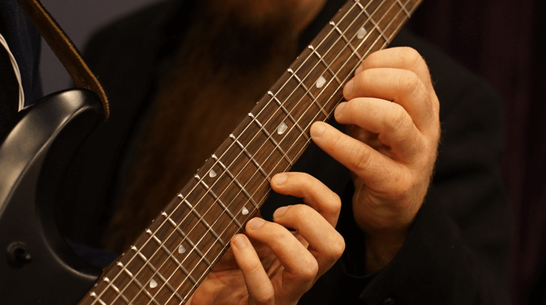 Play lead guitar creatively