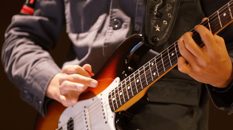 Play lead guitar solos