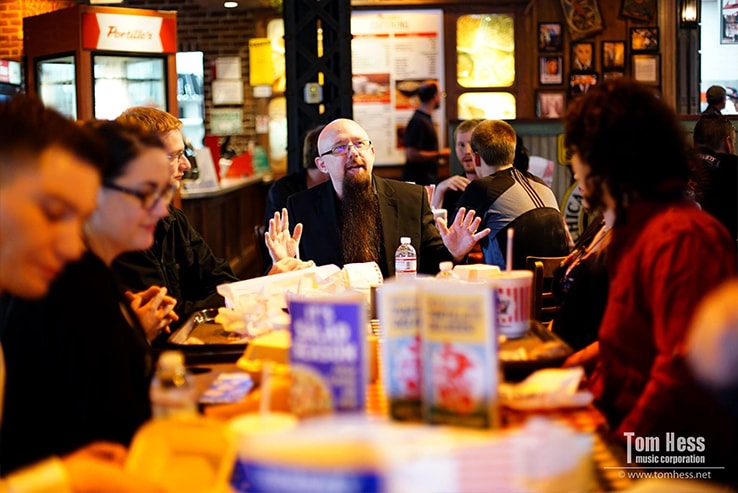 Tom Hess hanging out with his students