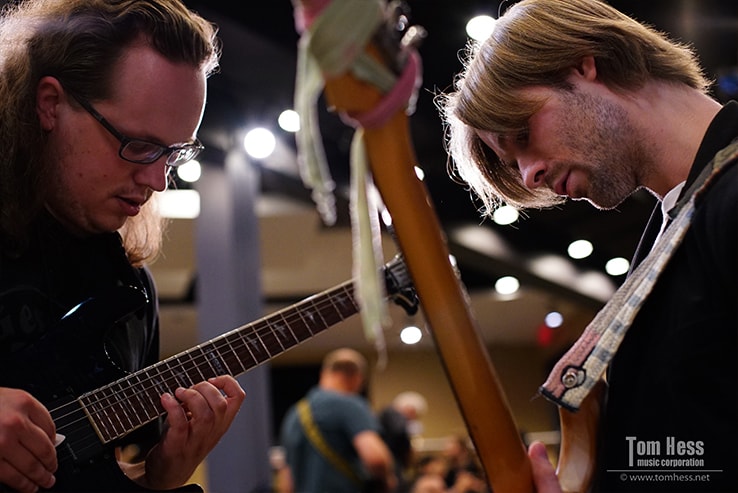 Guitarists playing together