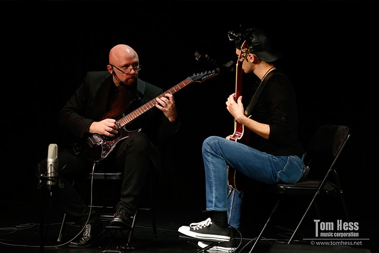 Tom Hess shows a guitar technique