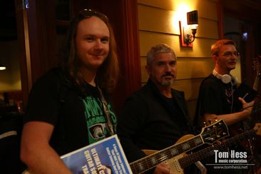 Guitarists at the live training class