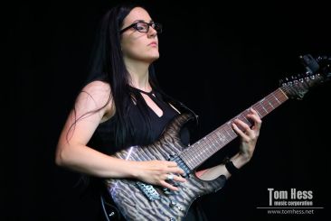 Perform live on guitar