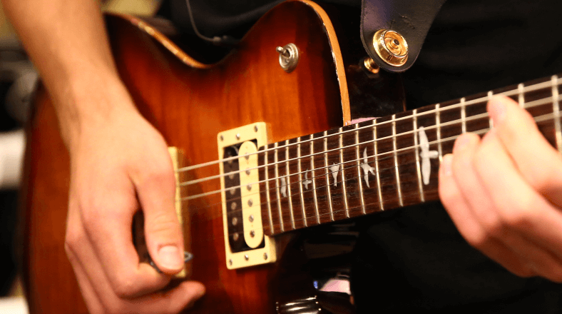 2-hand synchronization for guitar