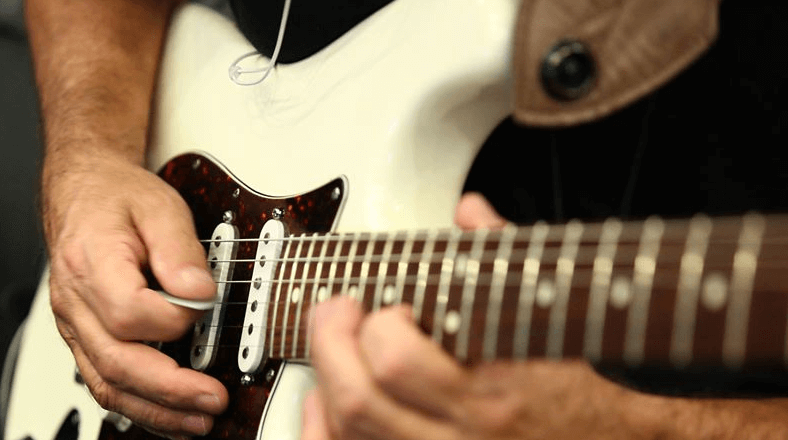How To Play Guitar Clean And Fast