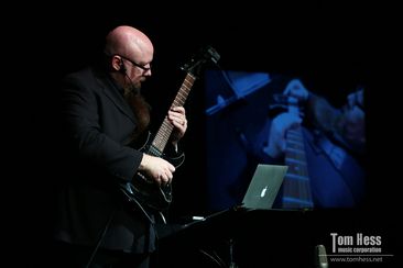 Guitar teacher Tom Hess