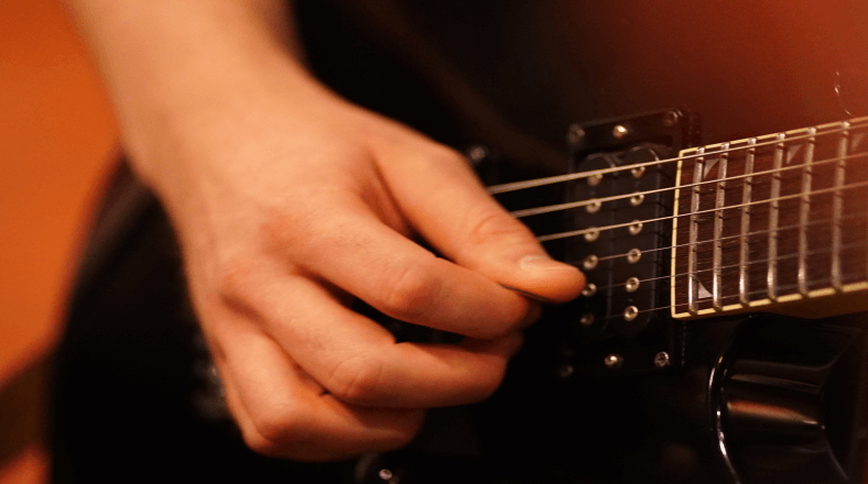 Play rhythm guitar